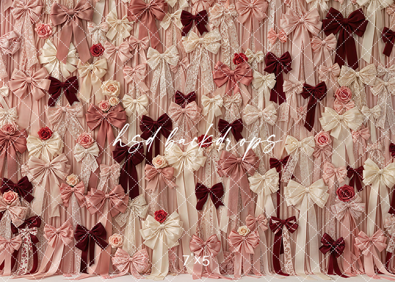 Valentine’s Day photography backdrop with blush and burgundy satin bows, lace ribbons, roses, and layered romantic textures.