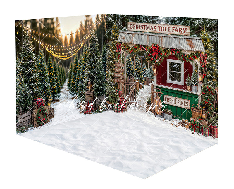 Fresh Pines Christmas Tree Farm Room Photography Backdrop featuring snowy evergreen trees, a rustic red and green tree farm booth, glowing string lights, festive garland, lanterns, wrapped gifts, plaid accents, and a snowy floor for holiday portraits.