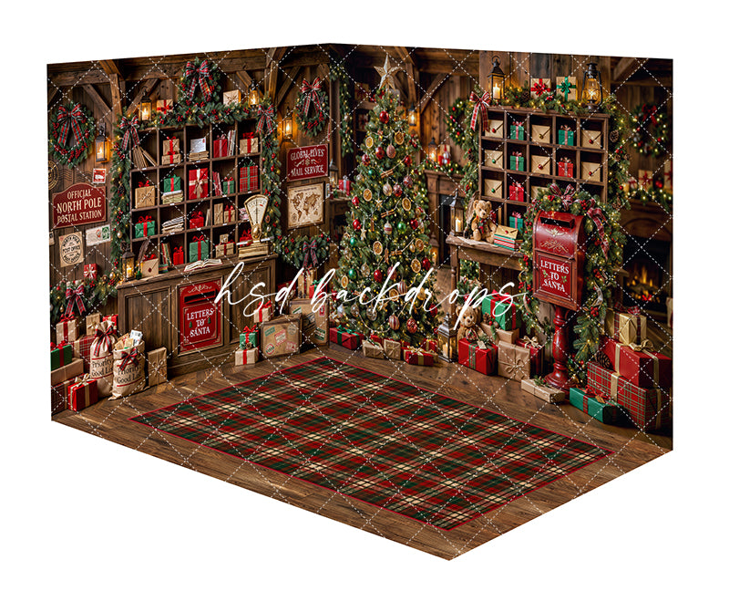Letters to Santa Post Office Room Photography Backdrop featuring a rustic North Pole mailroom with postal cubbies, red mailbox, decorated Christmas tree, wrapped packages, holiday garland, glowing lanterns, and plaid rug for Christmas portraits.