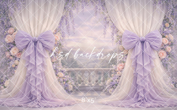Soft lilac wisteria photography backdrop with elegant bow drapery and floral garden balcony scene for maternity and milestone portraits.