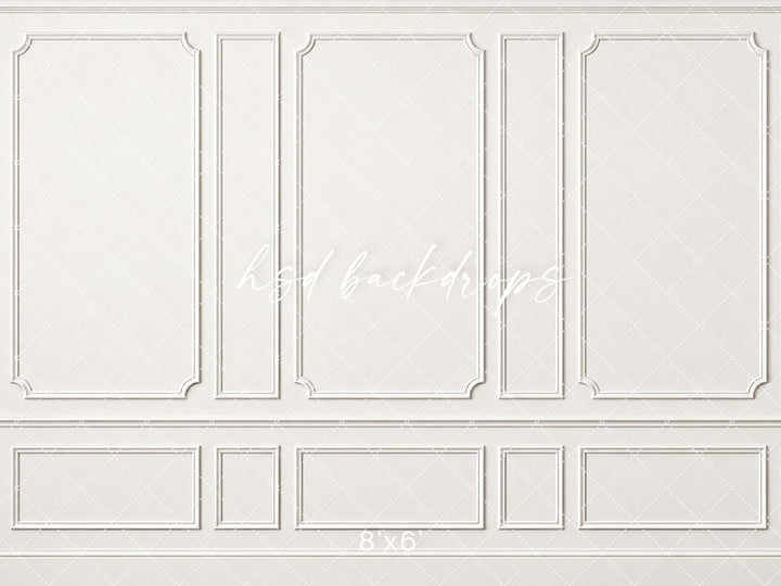 French white boiserie photography backdrop featuring traditional European wall paneling, decorative curved molding corners, and coordinating lower wainscot panels.