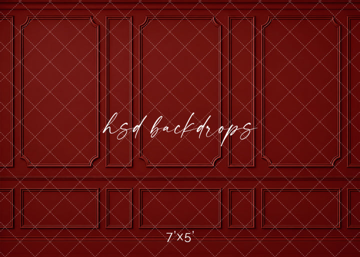 Heritage Red Wainscot photography backdrop featuring classic French-inspired boiserie wall molding, three tall decorative panels, narrow accent panels, elegant curved corners, and coordinating lower wainscoting in a rich deep heritage-red finish for fine art, Christmas, and elegant studio portraits.