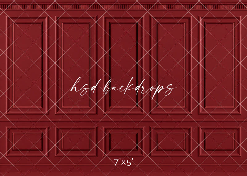 Vintage Red French Panel photography backdrop featuring traditional French-inspired boiserie wall molding, five tall symmetrical rectangular panels, ornate dentil-style crown molding, a classic chair rail, and coordinating lower wainscoting in a rich vintage Christmas red finish for holiday, fine art, maternity, and elegant studio portraits.