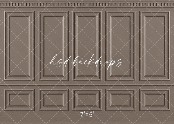 Warm Taupe French Panel photography backdrop featuring traditional French-inspired boiserie wall molding, five tall symmetrical rectangular panels, ornate dentil-style crown molding, a classic chair rail, and coordinating lower wainscoting in a sophisticated warm taupe, mushroom brown, and soft greige finish for fine art, maternity, newborn, branding, and elegant studio portraits.