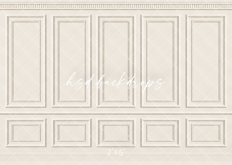 Classic Cream French Panel photography backdrop featuring traditional French-inspired boiserie wall molding, five tall symmetrical rectangular panels, ornate dentil-style crown molding, a classic chair rail, and coordinating lower wainscoting in a soft champagne ivory, warm cream, and antique white finish for fine art, maternity, newborn, bridal, and elegant studio portraits.