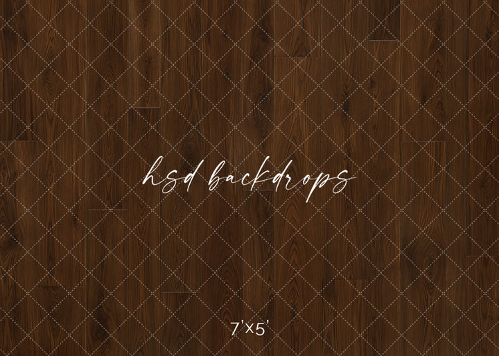 Warm walnut wood photography backdrop with realistic brown plank texture, natural wood grain details, and classic studio wall styling for portraits, cake smash sessions, branding photos, and seasonal setups.