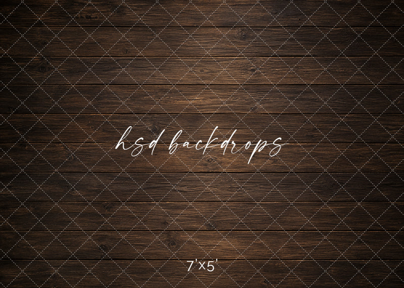 Aged Chestnut Wood Floor photography backdrop with dark brown wood planks, weathered grain texture, rich chestnut tones, and rustic studio floor styling for portraits, cake smash sessions, branding photos, and seasonal setups.