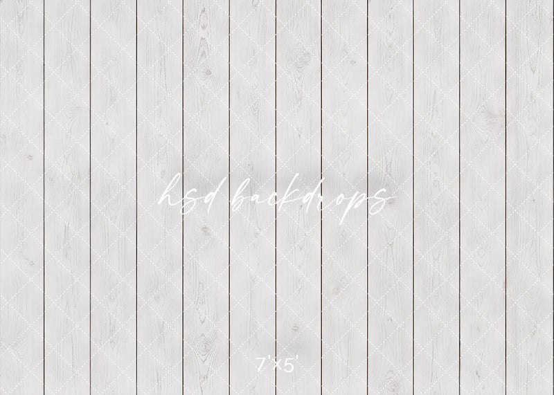 Whitewashed Wood Plank photography backdrop with bright white vertical wood boards, subtle wood grain texture, soft neutral tones, and clean studio portrait wall styling.