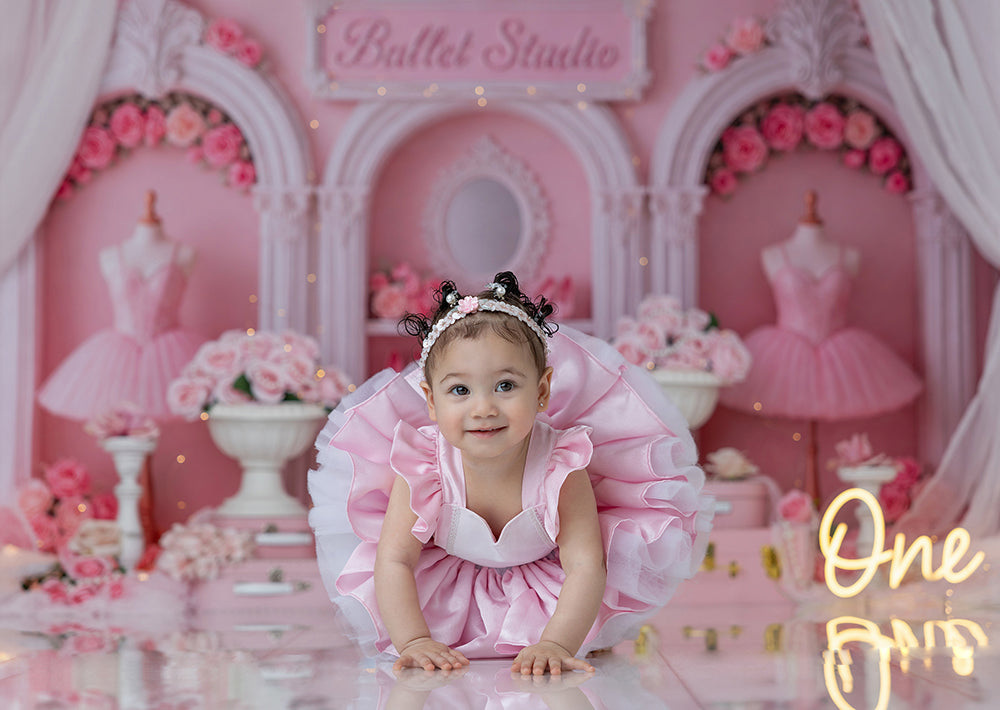 Pink Pointe Studio photography backdrop with pink drapery, ballet tutus, roses, pointe shoes, elegant arches, and soft studio styling for girls portrait photography.