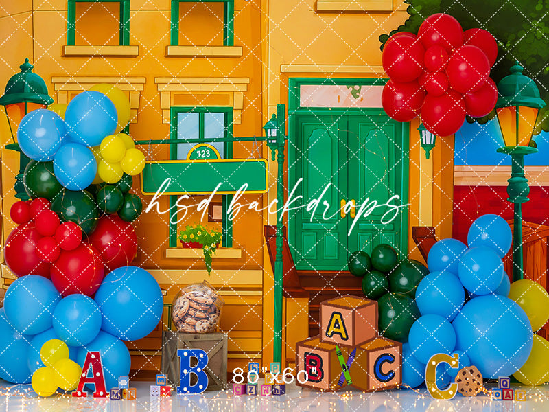 ABC Block Birthday photography backdrop with colorful balloon clusters, alphabet blocks, primary color accents, and playful birthday styling for children’s portrait photography.