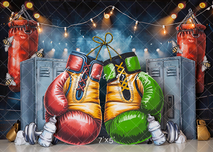 Little Champ Boxing photography backdrop with colorful boxing gloves, punching bags, gym lockers, athletic shoes, dumbbells, and string lights for boys birthday portrait photography.