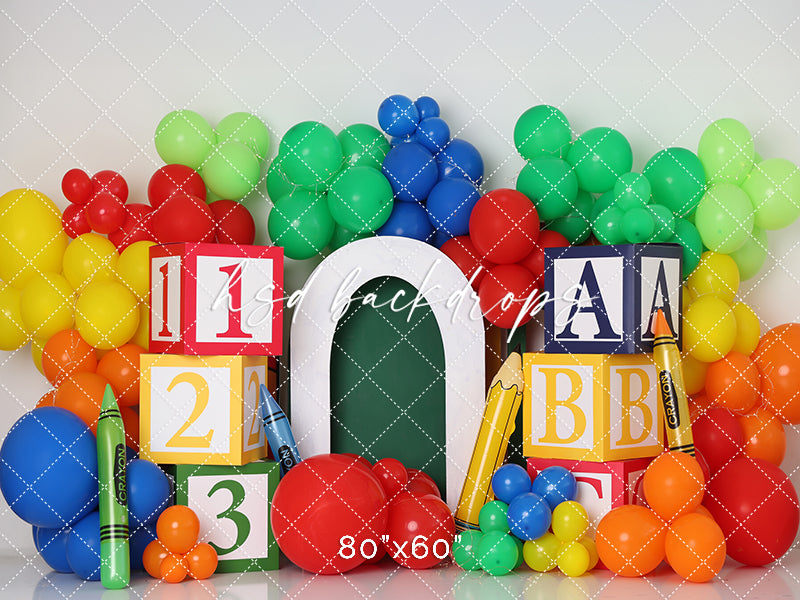 ABC & 123 Back to School Fun backdrop with colorful balloons, blocks, and crayons.