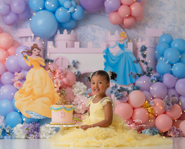 Enchanted Pastel Palace backdrop with pink castle, pastel balloons, and flowers.