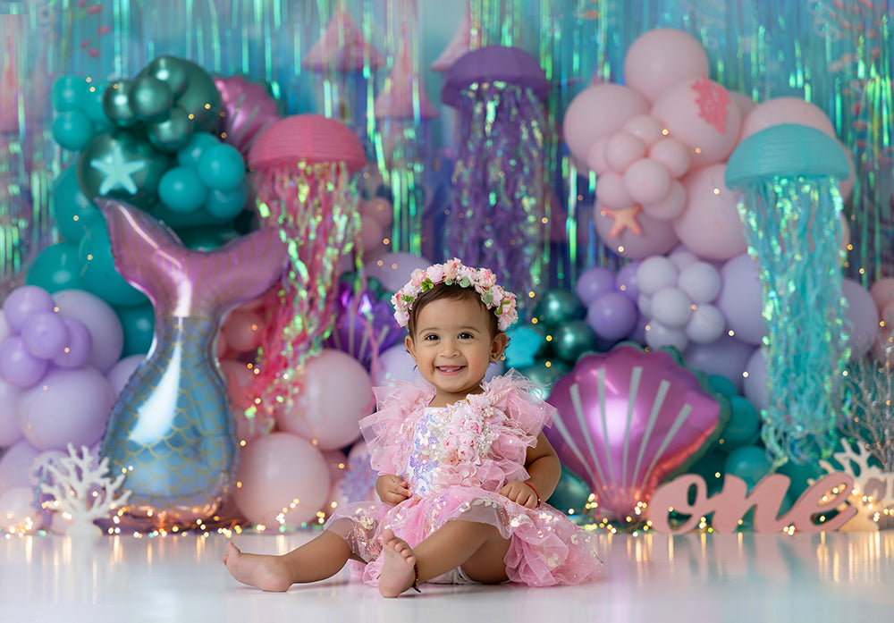 Siren’s Cove Under the Sea Mermaid Photography Backdrop with pastel balloons, seashells, and coral details for ocean-themed photoshoots.