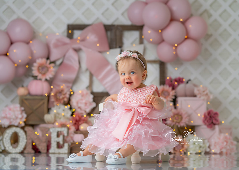 Blush Harvest Bow Fall Floral Cake Smash Backdrop with pumpkins, pink bow, and hydrangeas for photography.