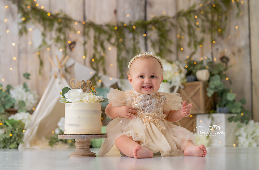 Sage Harvest Teepee rustic fall cake smash photography backdrop with greenery, pumpkins, and wood crates.