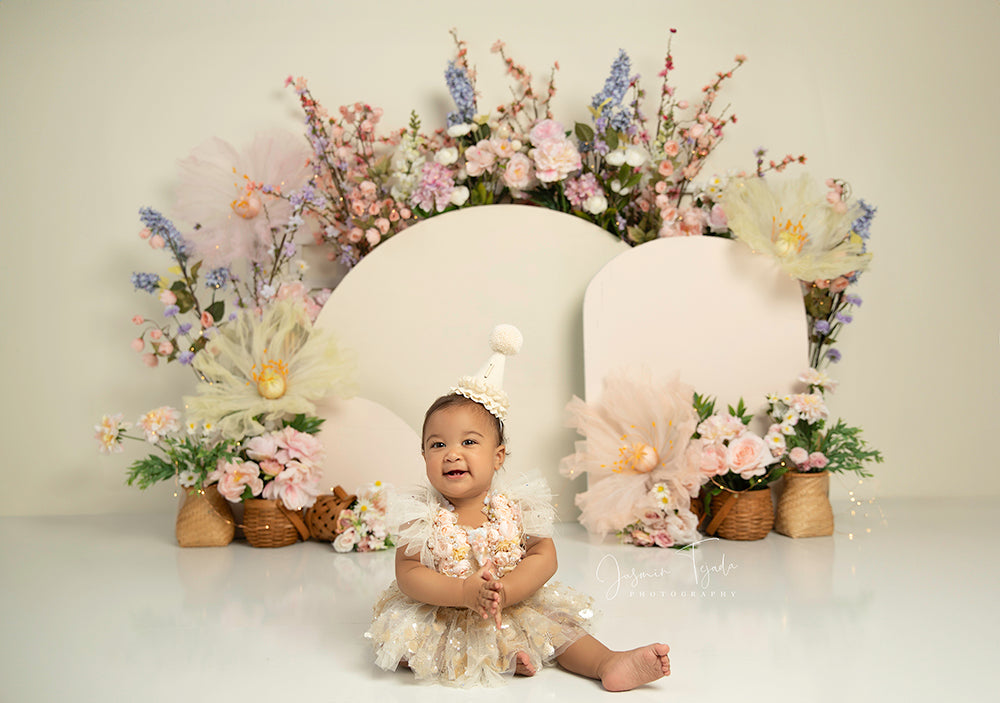Whispering Blooms spring floral arch photography backdrop with pastel flowers and neutral tones.