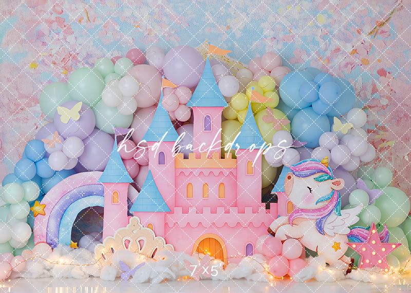 Unicorn Kingdom pastel castle photography backdrop with rainbow, unicorn, and soft pastel balloons.
