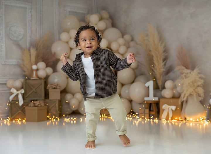 Boho Dreamer neutral balloon and pampas grass photography backdrop with wooden crates and soft beige tones.