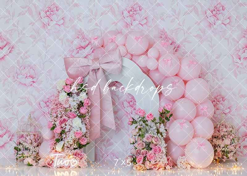 Blush Bloom Bow Two photography backdrop with pink florals, balloons, and bow for second birthday cake smash and milestone photo sessions.