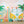 Summer photo backdrop with beach van, surf boards and palm trees for summer mini sessions